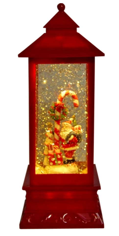 Christmas Lantern - A beautiful collectable lantern that lights up, with the figurine surrounded by glitter floating glitter glitter while on.