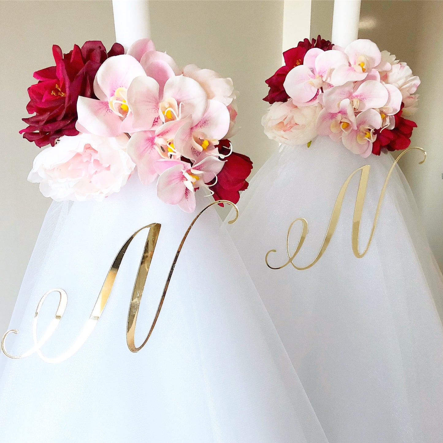 Our collection of exquisite Orthodox Christening/Wedding Pink & Burgundy candles, are meticulously crafted to add a touch of beauty and spirituality to your religious ceremonies.