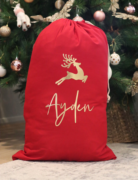 Red Personalised Santa Sack - The sacks are made from a cotton and are a drawstring closure.