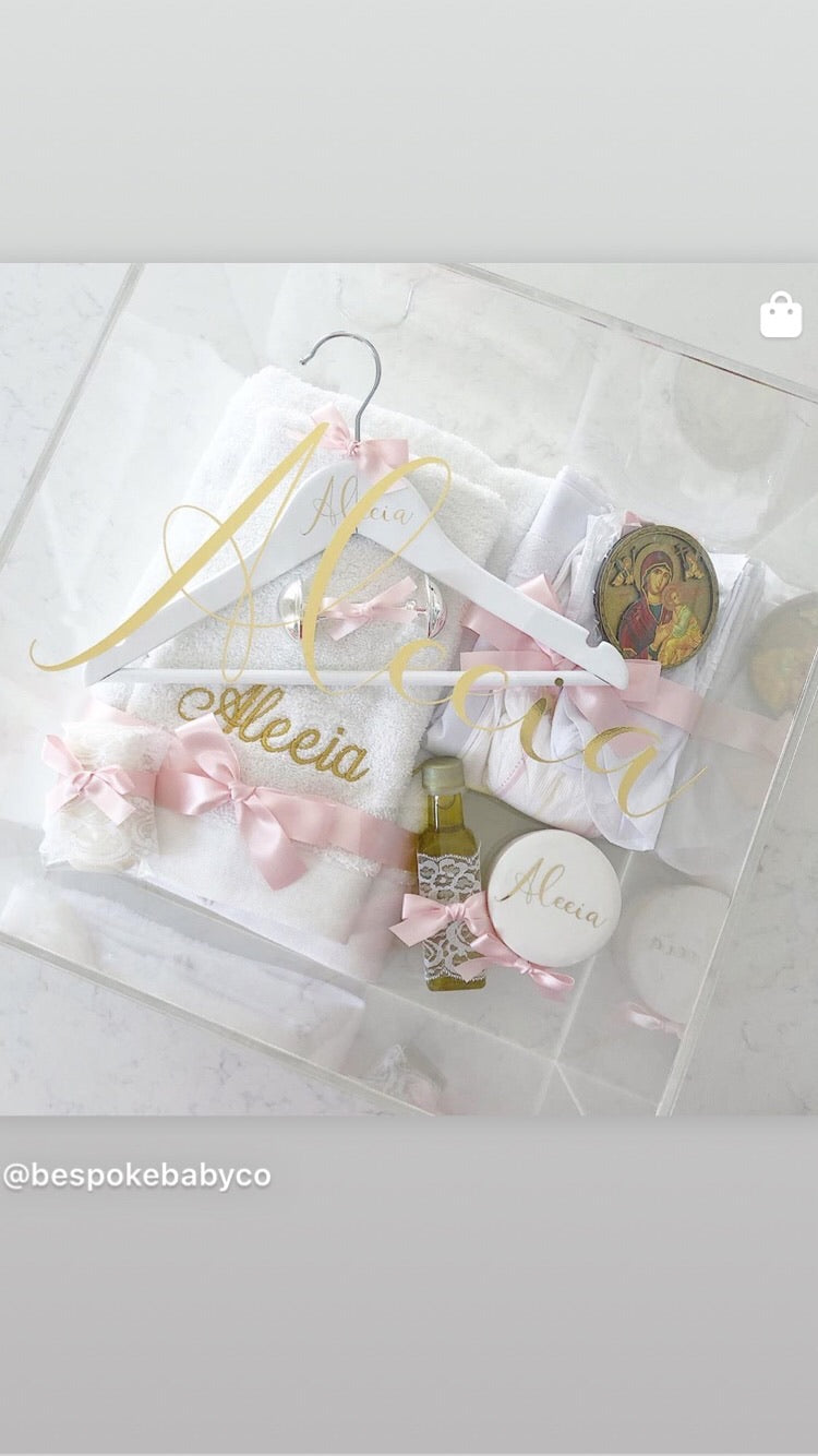 Luxe Lace Orthodox Package includes 1 x Your choice of White Extra Large Box, Clear Extra Large Acrylic Box, No Box. (Price varies depending on which option you choose.) 1 x Embroidered Bath Towel 1 x Embroidered Hand Towel 1 x Oil Sheet & Cap 1 x Singlet 1 x Oil 1 x Personalised Trinket Box 1 x Soap 1 x Socks 1 x Icon 1 x Rattle 1 x Brush Set