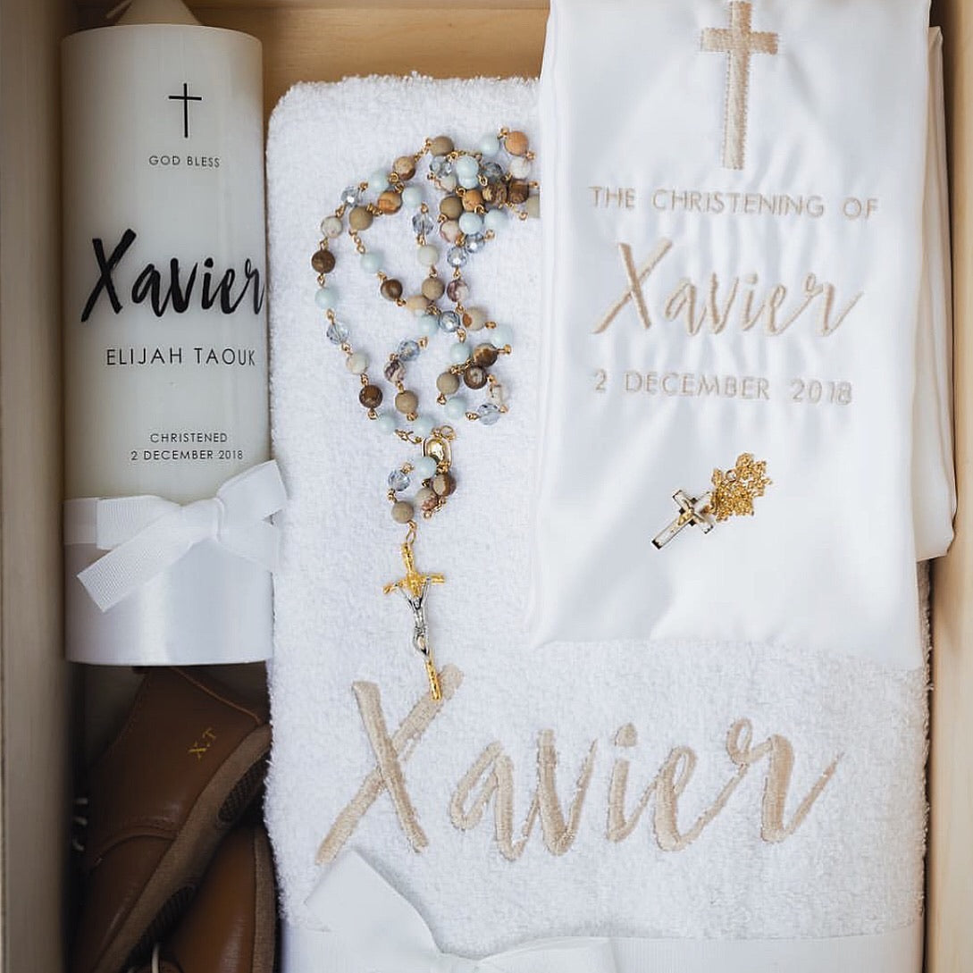 Premium Catholic Package includes 1 x Your choice of White Extra Large Box, Clear Extra Large Acrylic Box, No Box. (Price varies depending on which option you choose.)  1 x Embroidered Stole 1 x Embroidered Bath Towel 1 x Embroidered Hand Towel 1 x Baptism Candle
