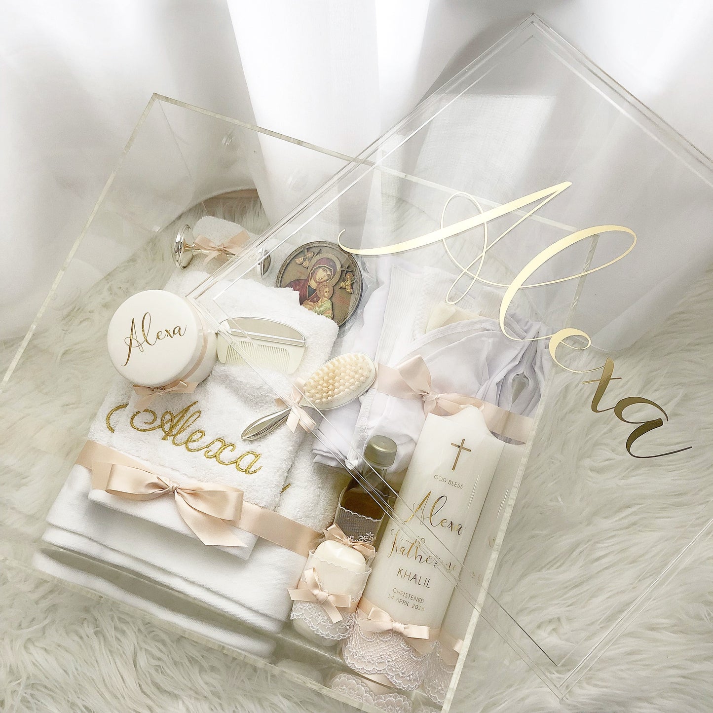 Luxe Catholic Package includes 1 x Embroidered Stole 1 x Embroidered Bath Towel 1 x Embroidered Hand Towel 1 x Baptism Candle 1 x Brush Set 1 x Rattle 1 x Trinket Box