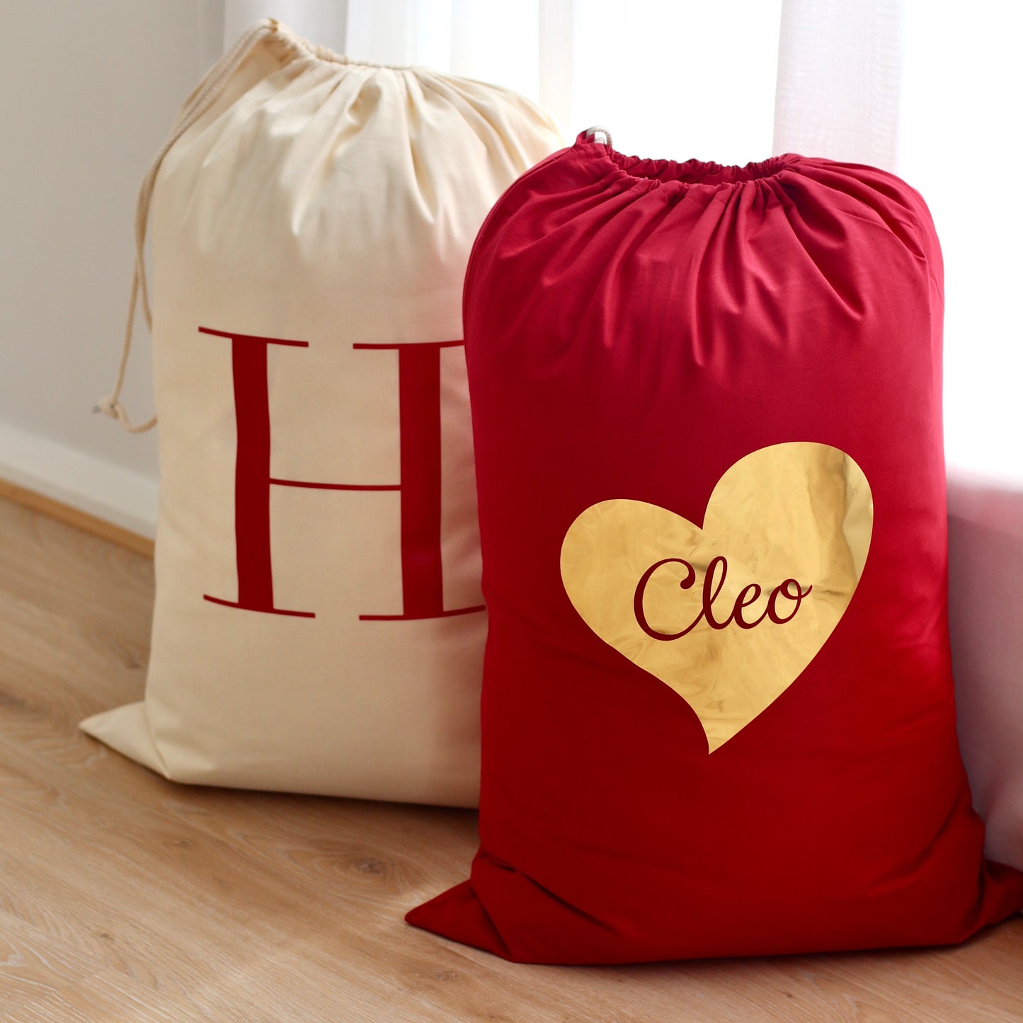 Red Personalised Santa Sack - The sacks are made from a cotton and are a drawstring closure.