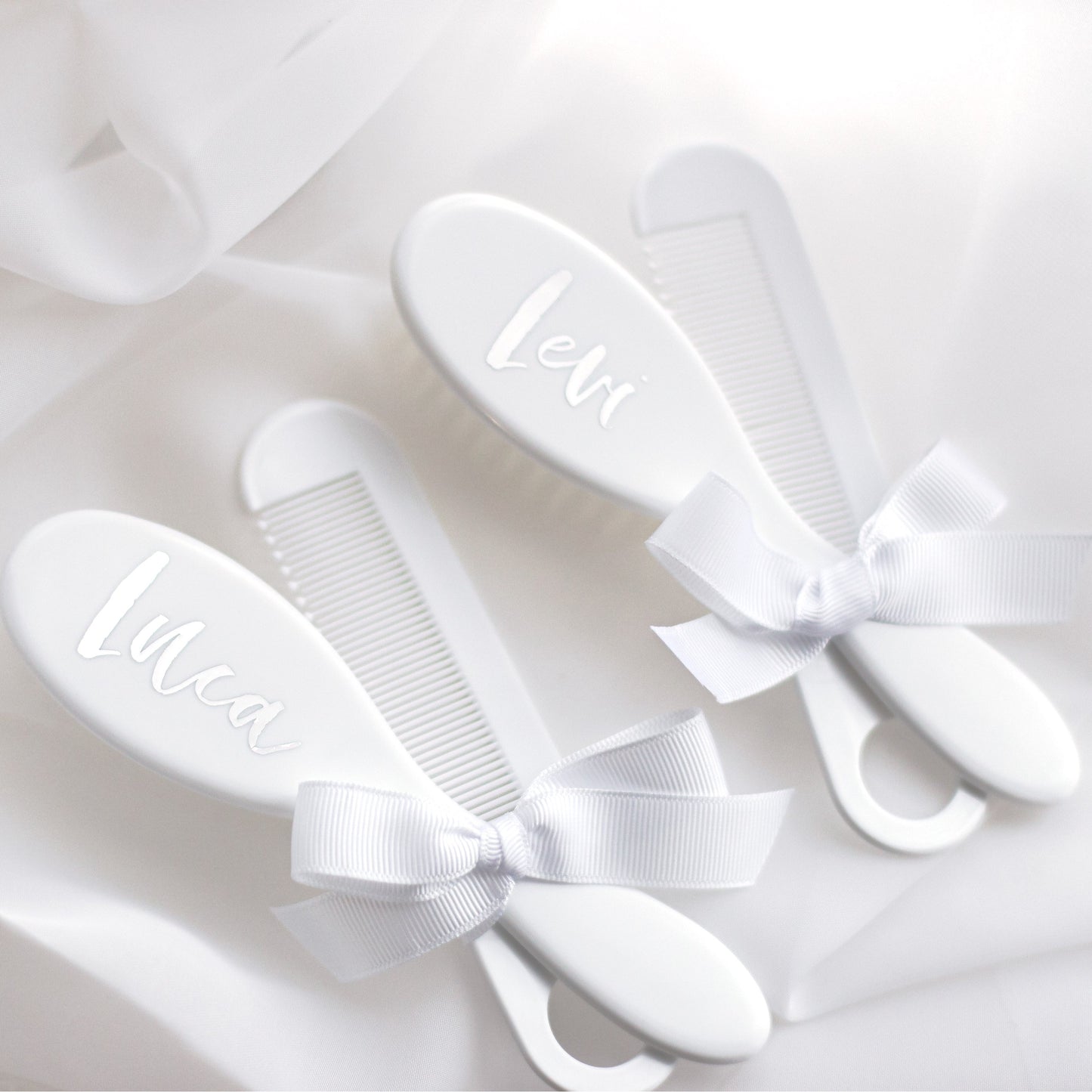 White Personalised Brush & Comb Set - The brush can personalised on the back with the child's name or initials. The brush is intended for babies and has soft bristles.