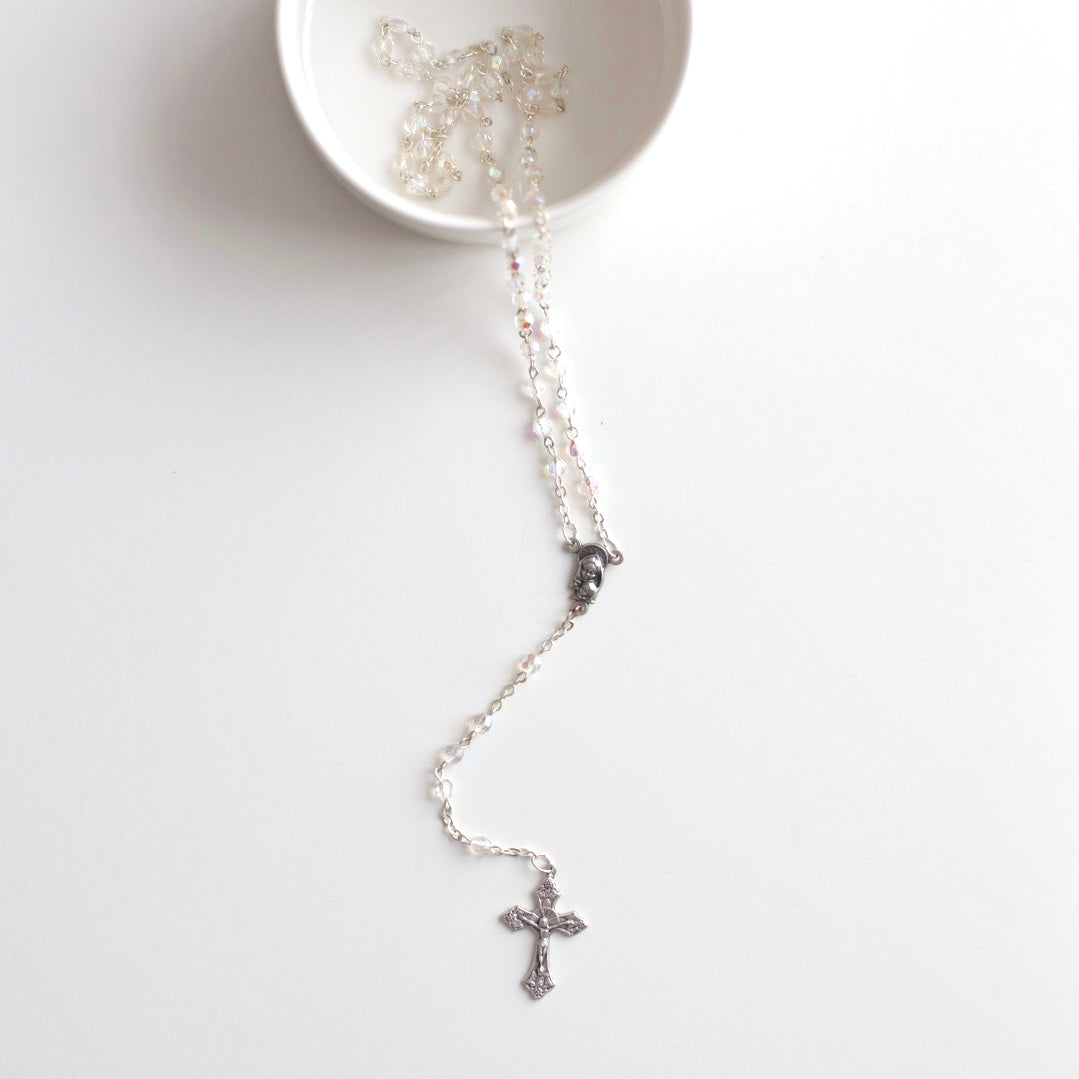 Our Crystal Rosary with silver hardware, perfect as a gift for a baptism or christening, or a communion gift. Perfect to add to one of Bespoke Baby Co's baptism packages