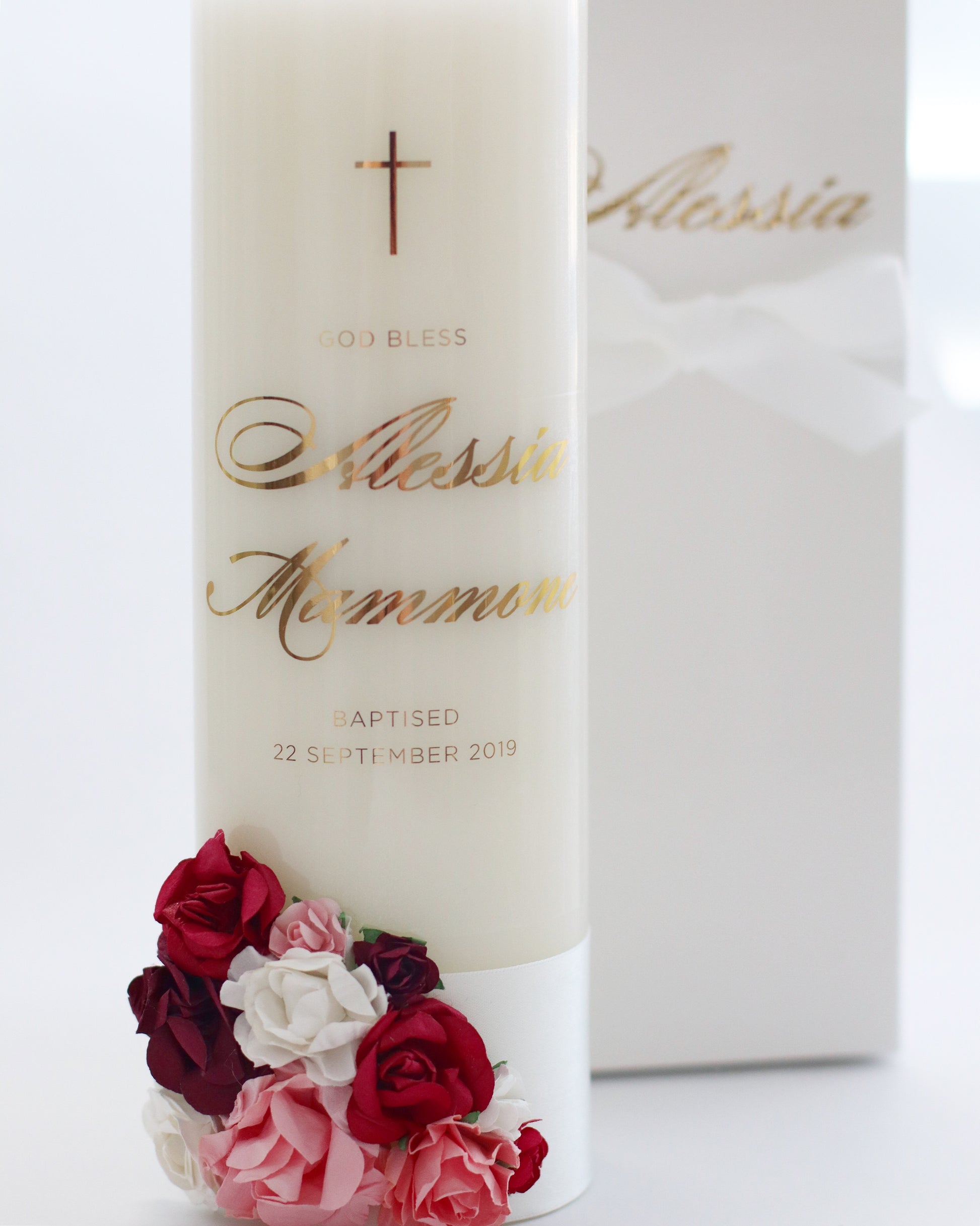The baptismal candle symbolises the light of Christ, the light of the world, and the light within your child.  With floral detailing.