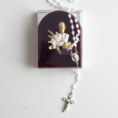 Our Gold Rosary with teardrop beads matched with our communion icon, perfect as a gift for a communion. 