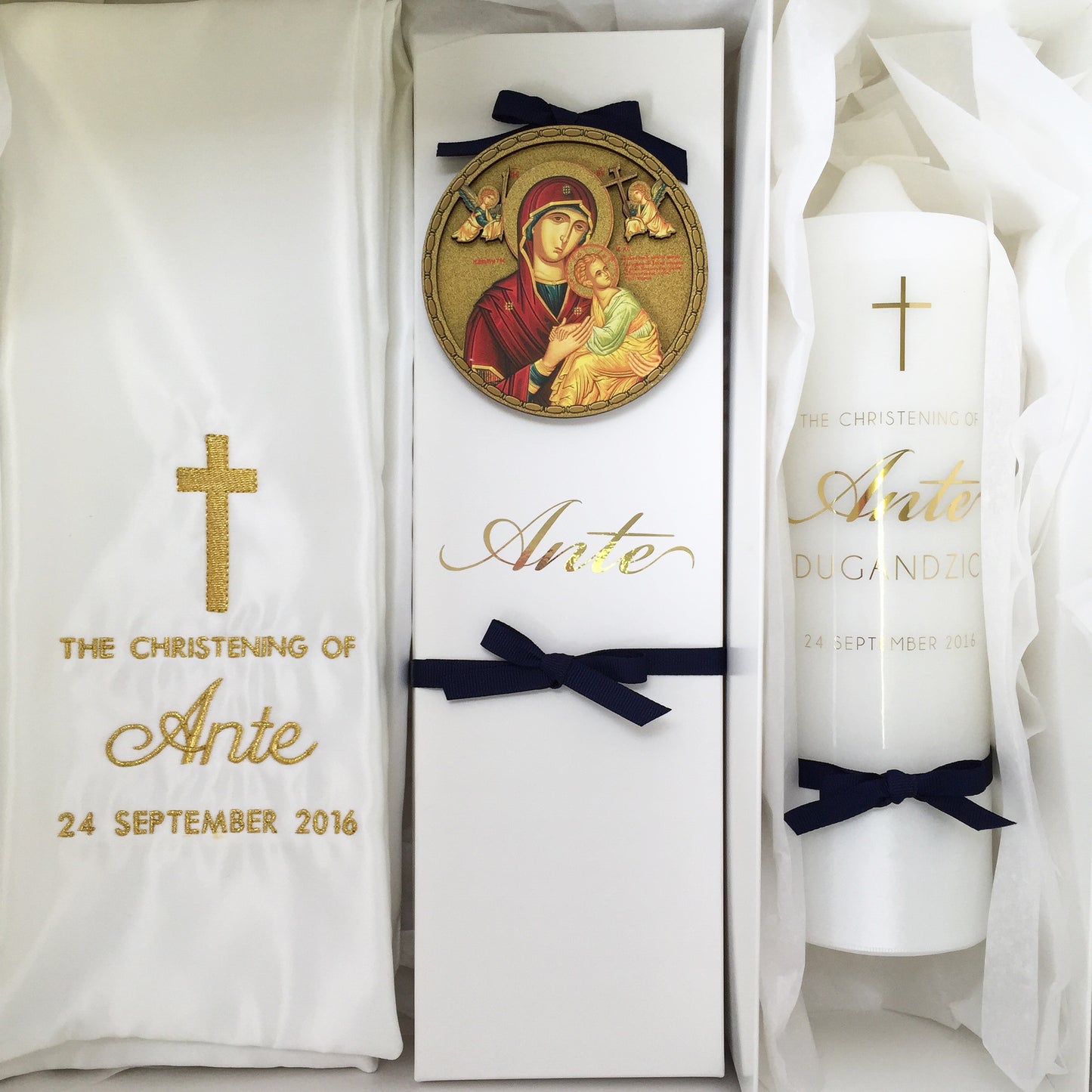 This Classic Catholic Package comes with your choice of White Extra Large Box, Clear Extra Large Acrylic Box or No Box. + 1 Embroidered Stole + 1 Baptism Candle