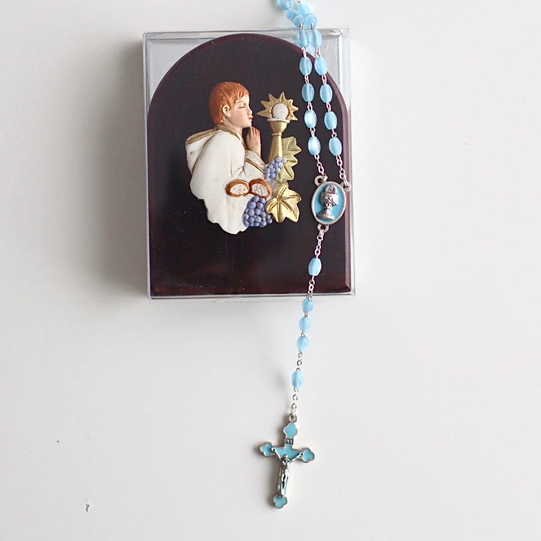 Our Gold Rosary with teardrop beads matched with our communion icon, perfect as a gift for a communion. 