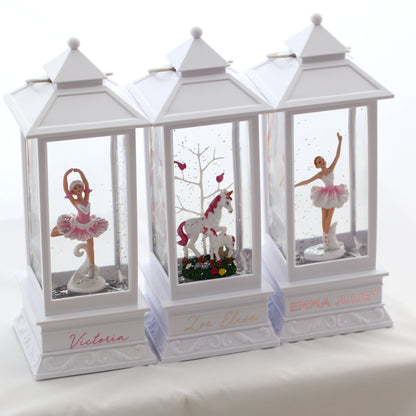 Our Night light Lantern is a beautiful collectable lantern that lights up, with the figurine surrounded by glitter floating glitter while on.