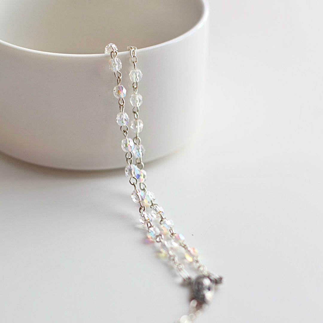 Our Crystal Rosary with silver hardware, perfect as a gift for a baptism or christening, or a communion gift. Perfect to add to one of Bespoke Baby Co's baptism packages